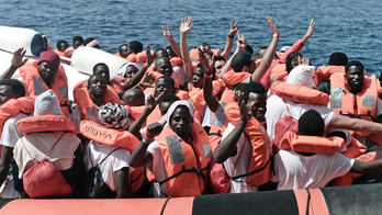 The Latest: Pope criticizes leaving migrants at waves' mercy