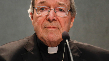 Pope's top aide is charged in sex assault case in Australia
