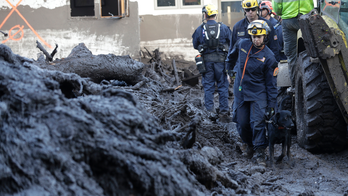 The Latest: Officials chase reports of missing in mudslides