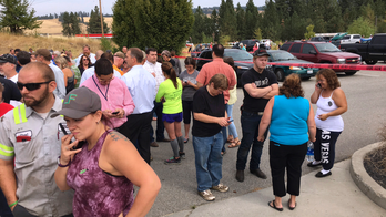 Officials: Student killed confronting shooter at high school