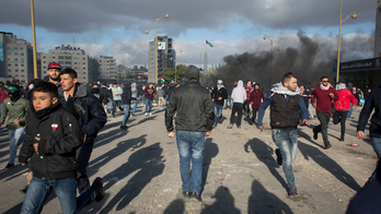 The Latest: Al-Qaida urges attacks on US after Trump move