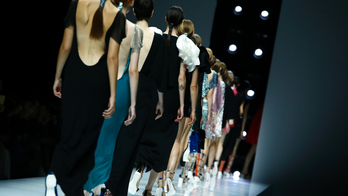 Jean Reno talks seduction at Lanvin designer's Paris debut