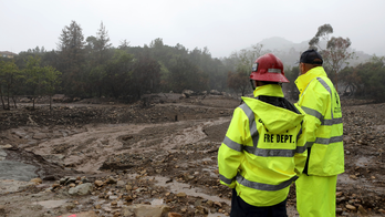 The Latest: Small dam failure averted after leaks