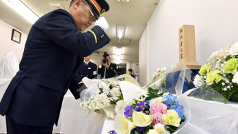 The Latest: Tokyo subway workers mark gas attack anniversary
