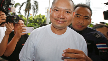 'Jet-set monk' is back in Thailand after extradition from US
