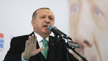 The Latest: Turkey's Erdogan to 'drown' Syrian Kurdish force