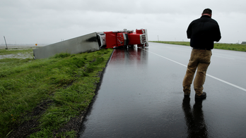 At least 2 dead as Harvey slams Texas coast, causing floods