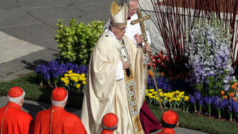Pope celebrates Easter Mass in packed St. Peter's Square