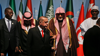 The Latest: Abbas says no role for US in Mideast peace push