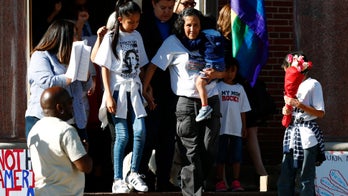 The Latest: 30 immigrants getting 2-year extensions