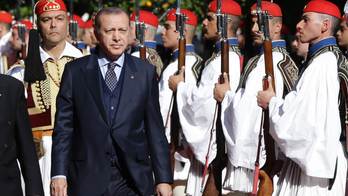The Latest: Erdogan's visit to Greece starts on tense note