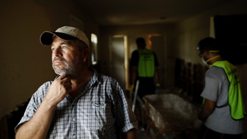 Working poor on Minden Street exhausted after Harvey