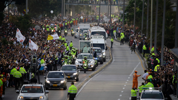 The Latest: Crowds greet pope in Colombia