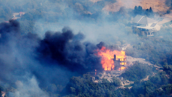 The Latest: Los Angeles wildfire mostly contained