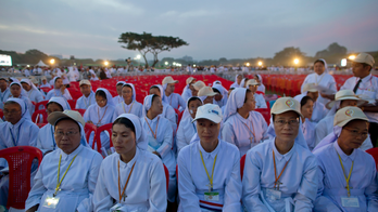 Pope's first Mass in Buddhist Myanmar draws huge turnout
