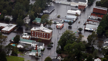 Swollen rivers near record levels as Florence looms