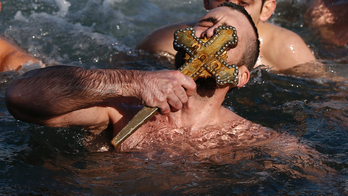 The Latest: Greek Orthodox mark Epiphany with Istanbul swims