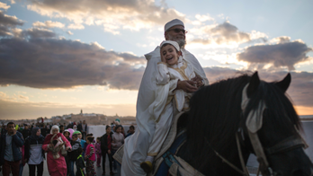 AP PHOTOS: Prophet's birth brings color, music to Morocco