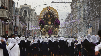 AP PHOTOS: Peru venerates Lord of Miracles in big procession