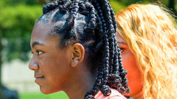 Archdiocese says school's hair extension policy rescinded