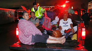 Wary Louisiana prepares for inundation by Harvey