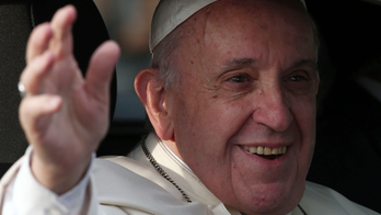 AP PHOTOS: Pope draws crowd to Chile Mass, also protests