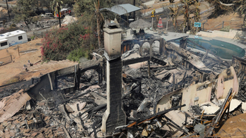 The Latest: Largest California wildfire over half contained