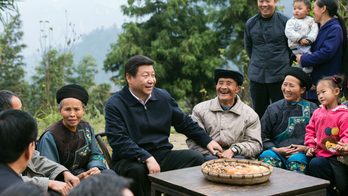 China widens personality cult around 'unrivaled helmsman' Xi