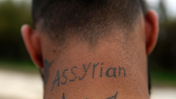 Syria's tiny Assyrian community celebrates its survival