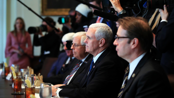 Pence to delay Mideast trip as tax deal nears vote