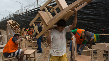 AP PHOTOS: Peru prisoners build chairs for papal visit