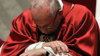 The Latest: Pope presides over Way of the Cross procession