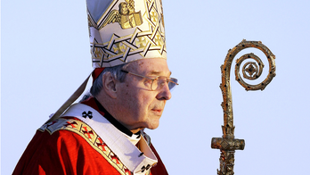 The Latest: Support group applauds charges against cardinal