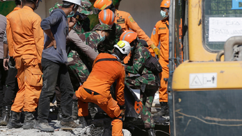 The Latest: Indonesia survivor says many buried in mosque