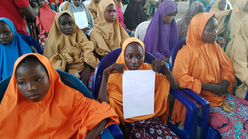 The Latest: Nigeria says 1 girl still a Boko Haram captive