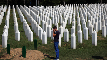 Bosnian Serb leader denies scope of Srebrenica massacre