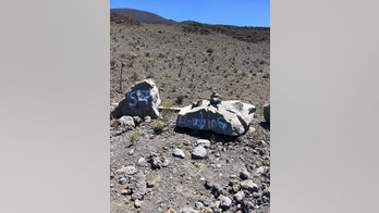 Hawaii investigates graffiti found on revered mountain