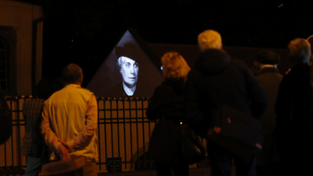 Faces of Holocaust victims projected on Prague synagogue