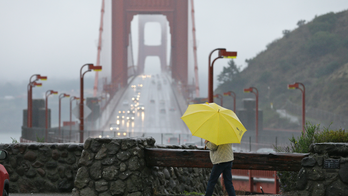 The Latest: California storm floods roads, loosens hillsides
