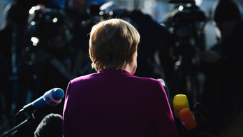 The Latest: Report: German parties near coalition deal