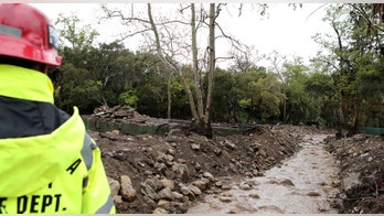 California rain brings flooding streets, swelling rivers