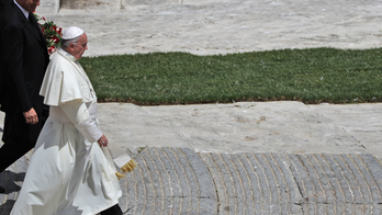 Pope removes German cardinal as sex abuse crisis catches up