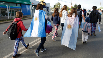 The Latest: Pope celebrating Mass at notorious air base