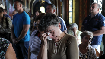 Tears, grief at memorial service for Greek wildfire victims