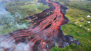 Faster-moving Hawaii lava gushes into sea, spews new danger