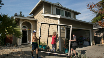 The Latest: Driver killed in California blazes identified