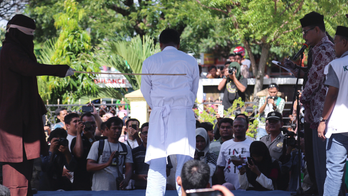 Indonesia's Aceh carries out public canings despite pledge
