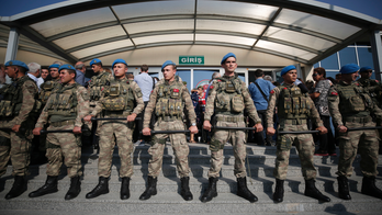 Turkey issues warrants for ex-agents for links to cleric