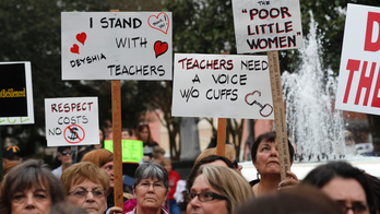 Teacher: Lawsuit over her forcible removal seems likely