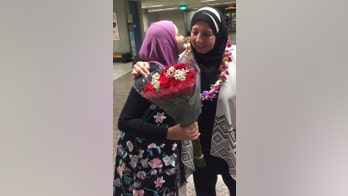 APNewsBreak: Grandmother in travel ban lawsuit arrives in US